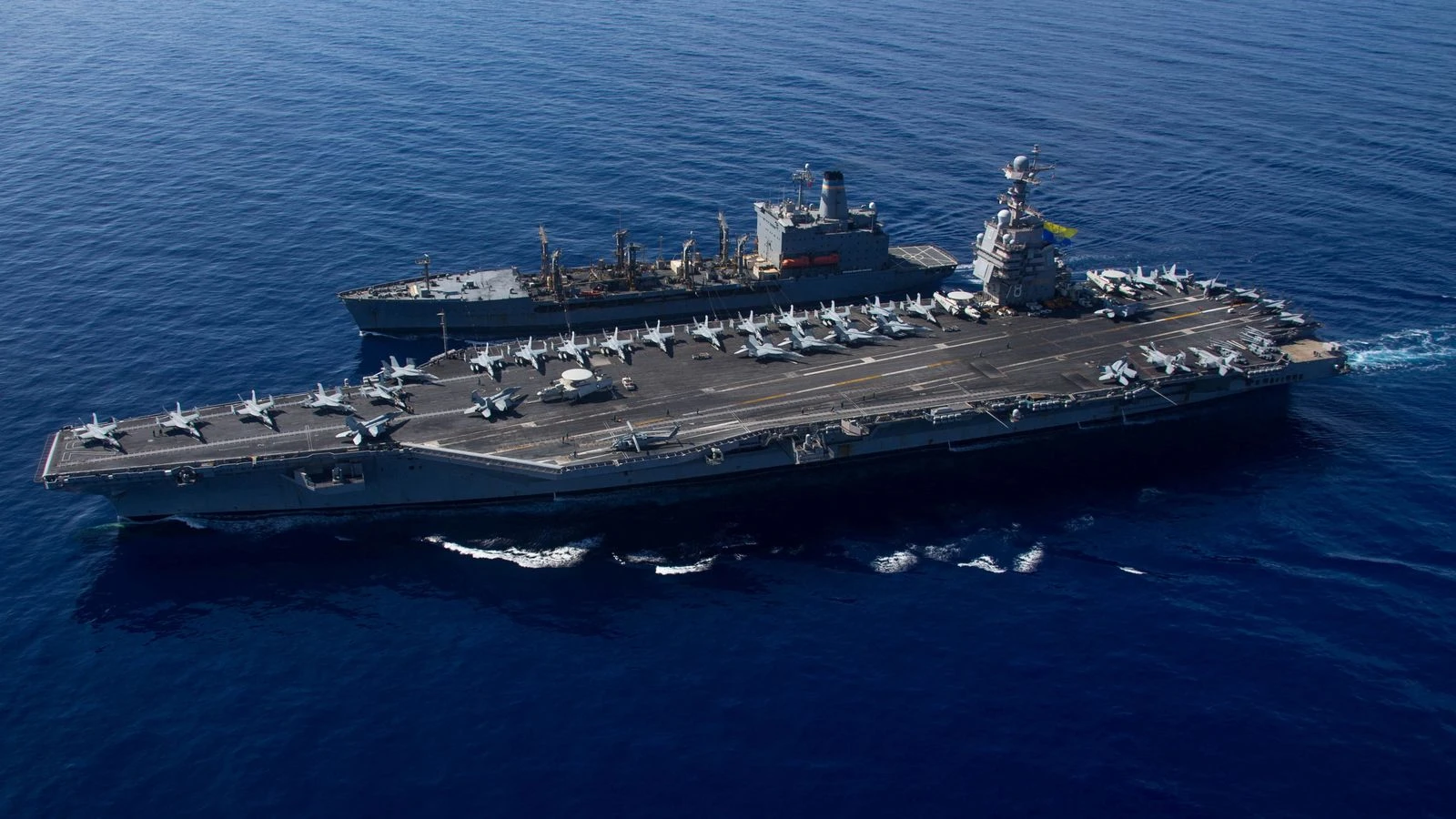US ramps up 'drug boats' operation by sending in aircraft carrier