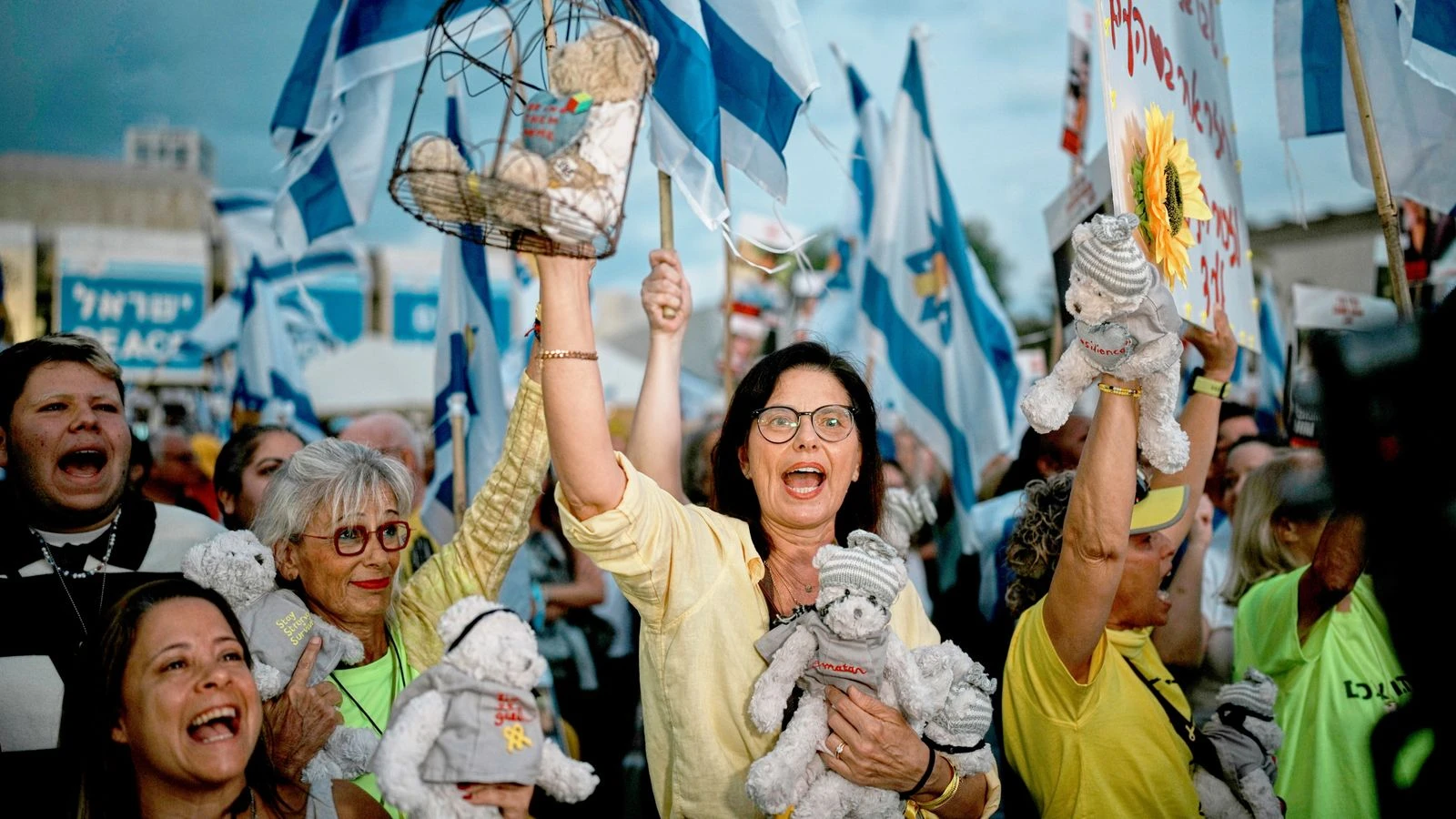 Chants of frustration turn into songs of celebration as crowds greet hostages