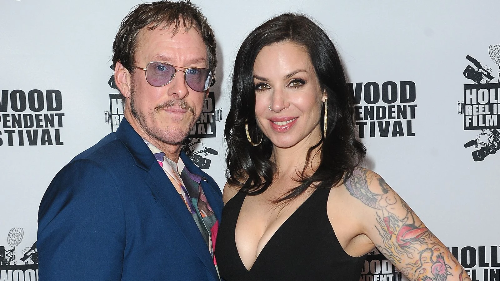 Weezer bassist's wife shot and arrested on suspicion of attempted murder