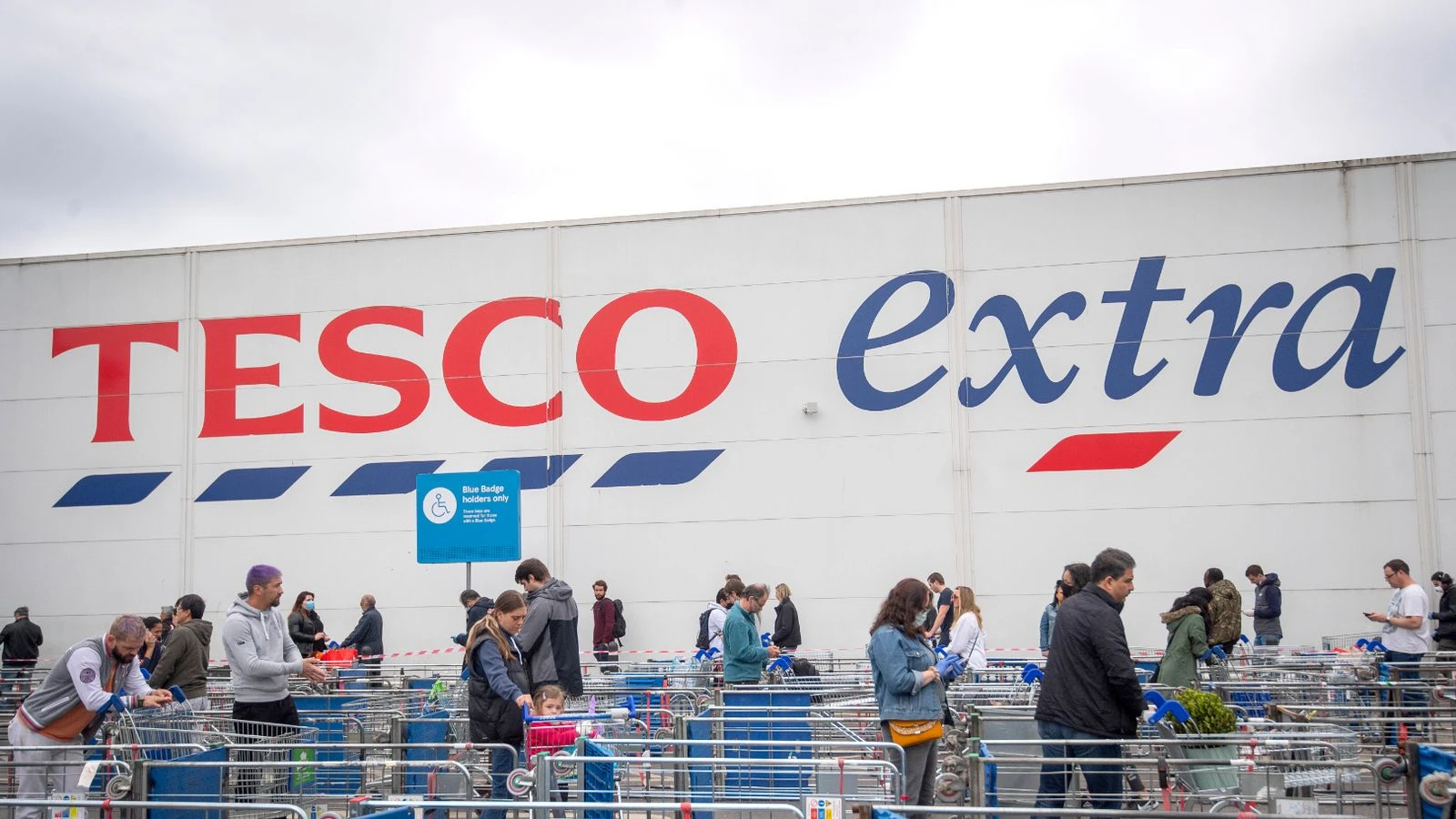 Tesco takes £533m virus hit but investors still get big pay day