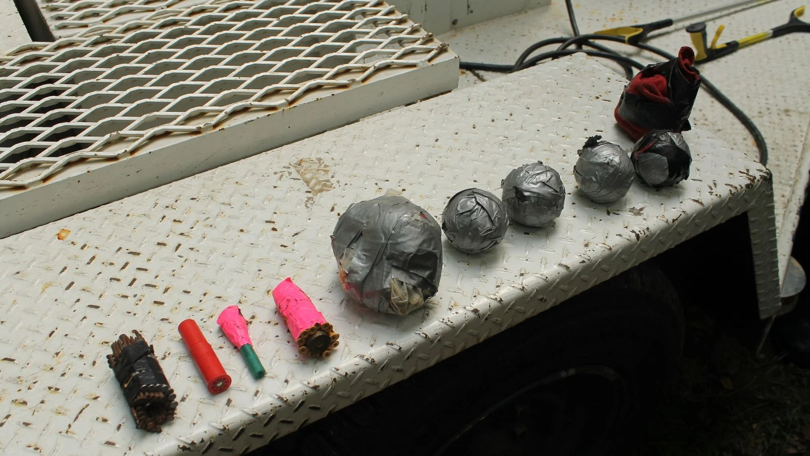 Man tries to detonate 14 explosive devices while being arrested by police