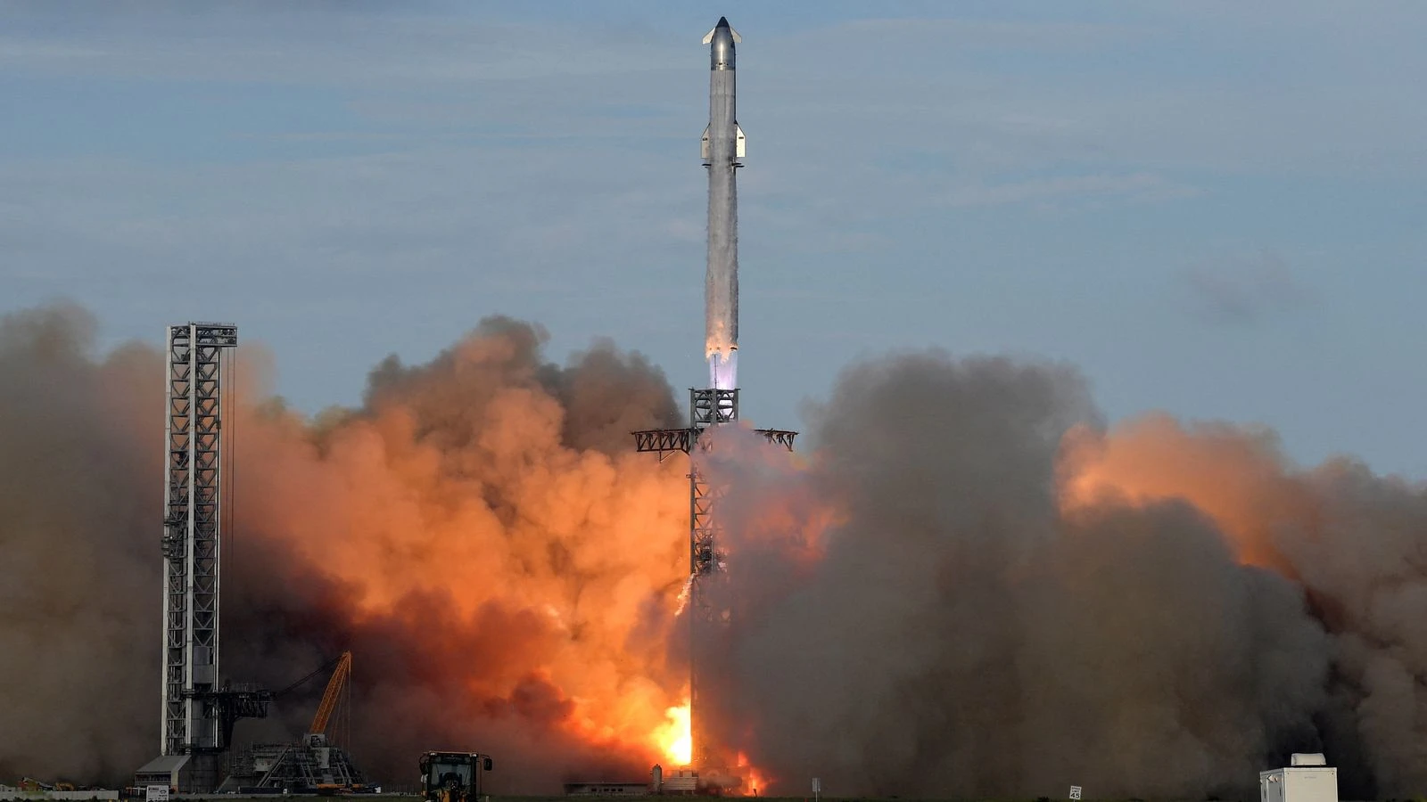 SpaceX's biggest rocket completes spectacular test flight after year of mishaps