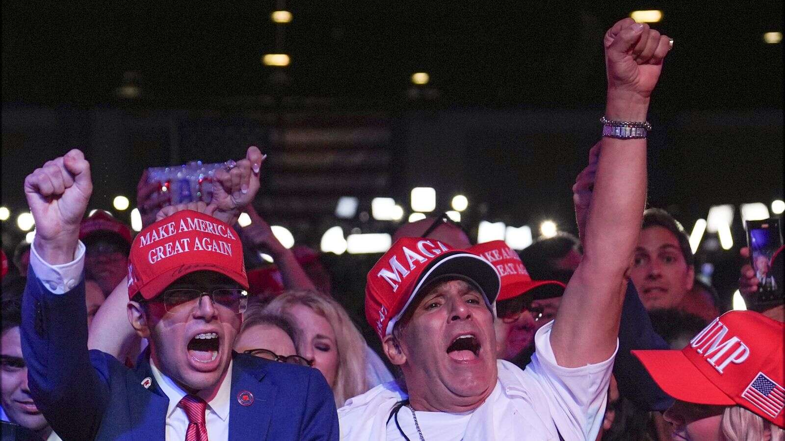 Trump supporters sense a win as they turn off the news for MAGA anthem