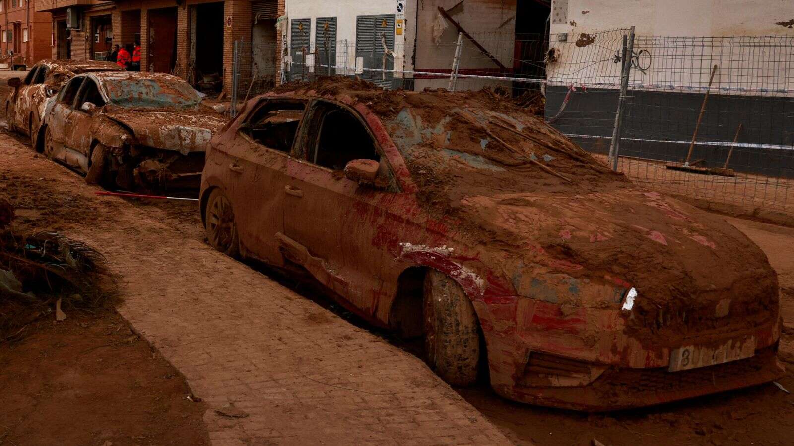 Cars 'covered in plastic wrap' in Spain as residents brace for another storm