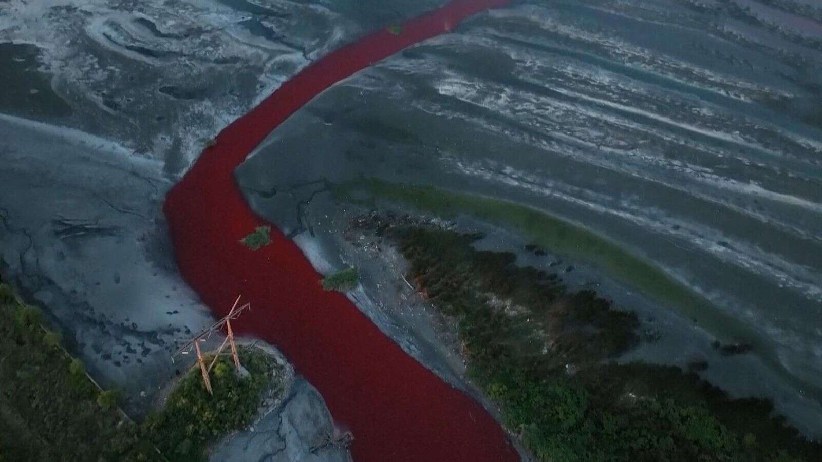 River in Argentina turns bright red