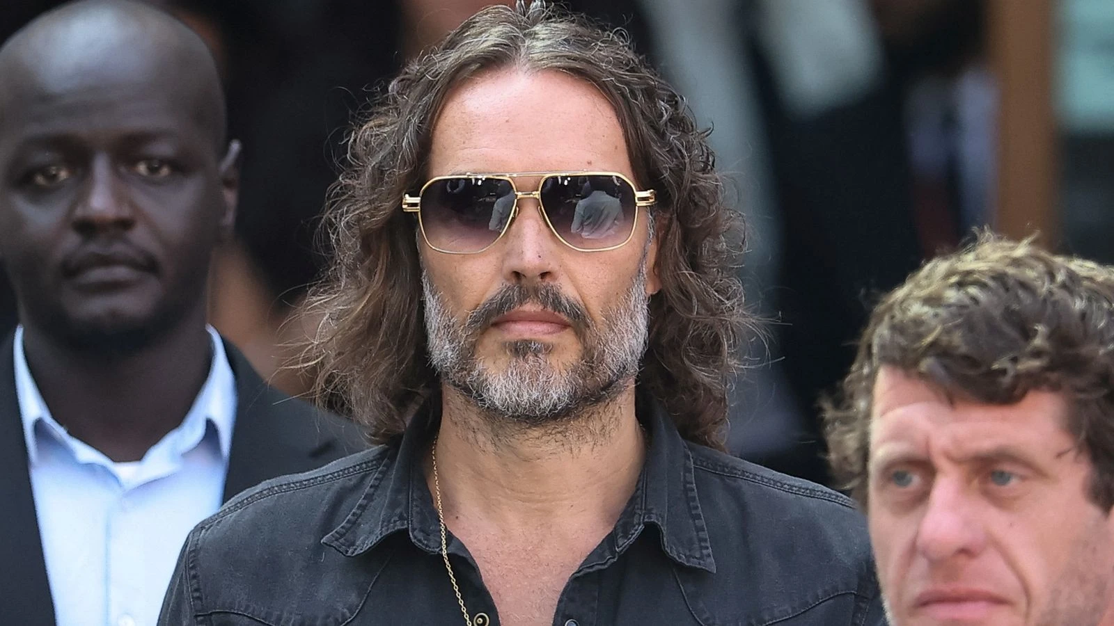 Russell Brand arrives at court for plea hearing