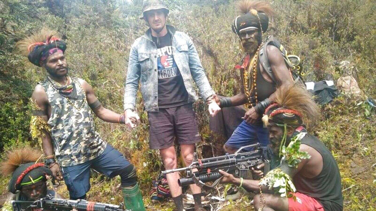 NZ pilot held hostage by Papuan fighters is freed