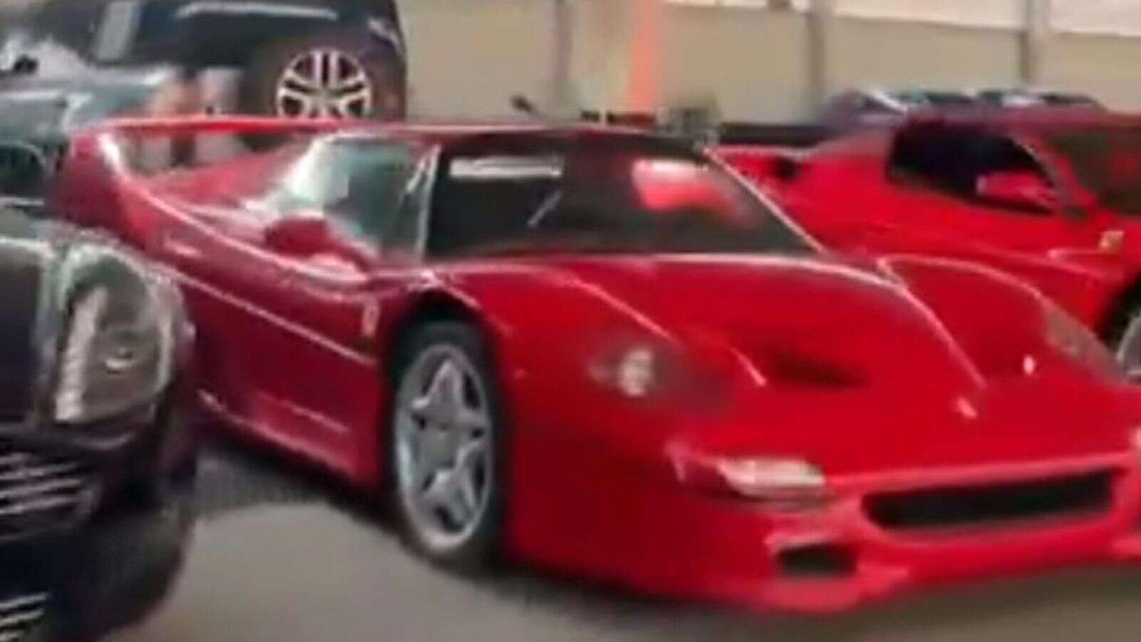 Rebels storming Assad's palace find luxury car collection including rare Ferrari 'worth £3m'