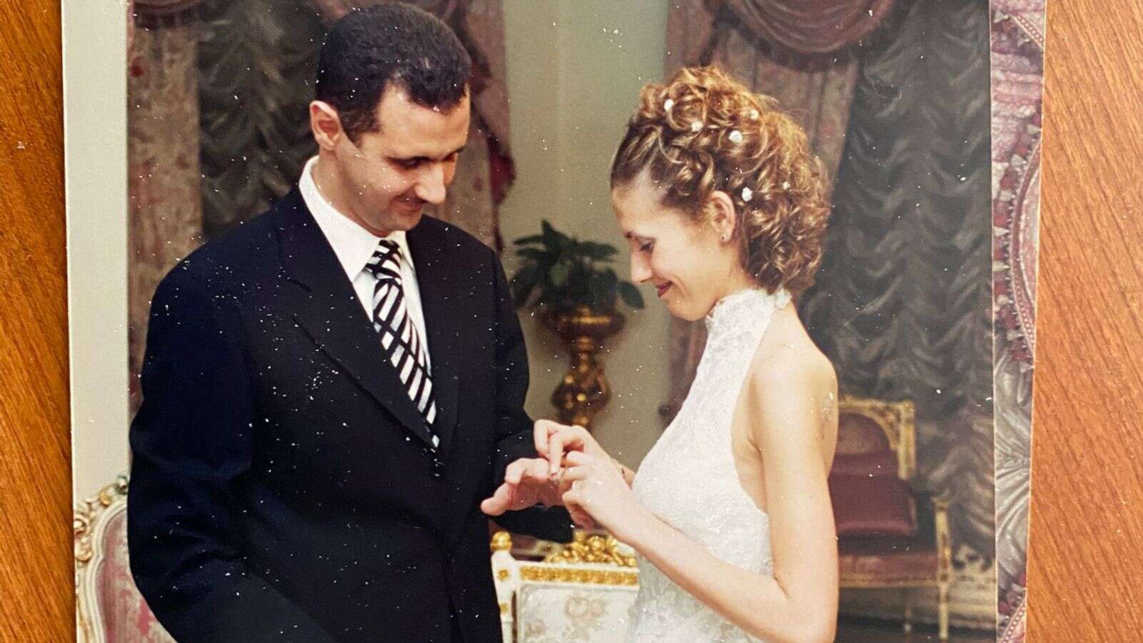 Inside a dictator's family home: Wedding photos, homework and handwritten notes found in Assad's abandoned house