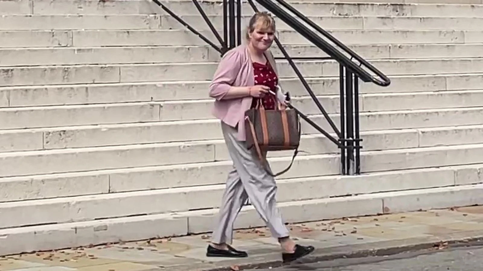 Former Conservative MP appears in court accused of having false passport