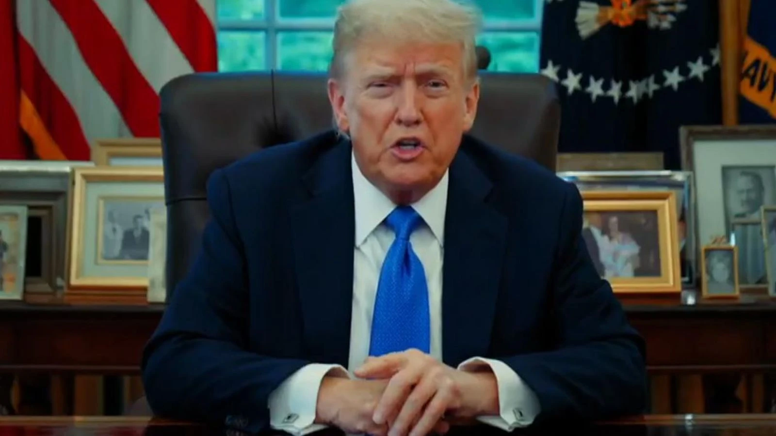 Trump signs travel ban targeting 12 countries with 'hostile attitudes' to the US
