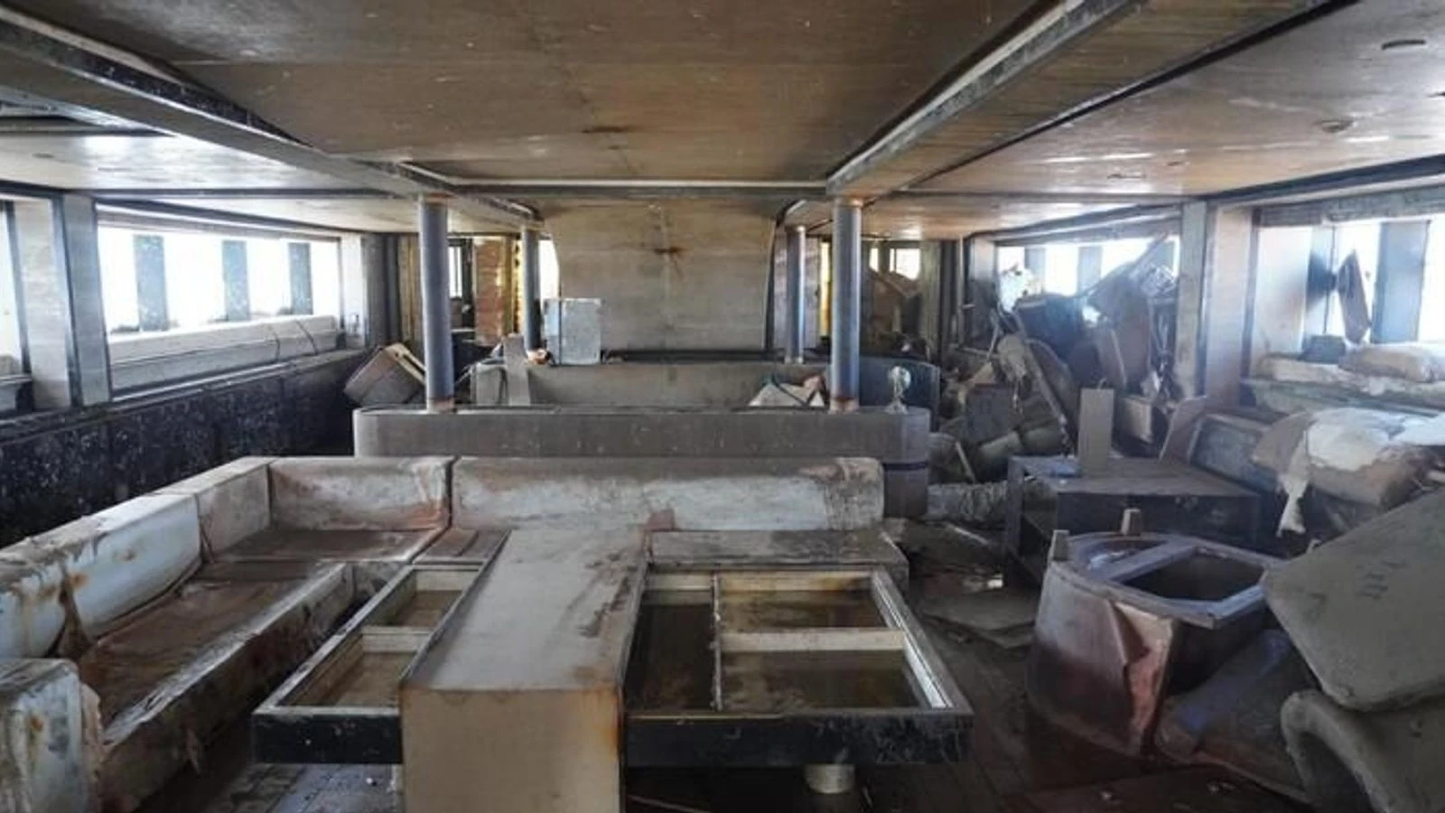 Pictures reveal inside of sunken superyacht after it was resurfaced for full examination