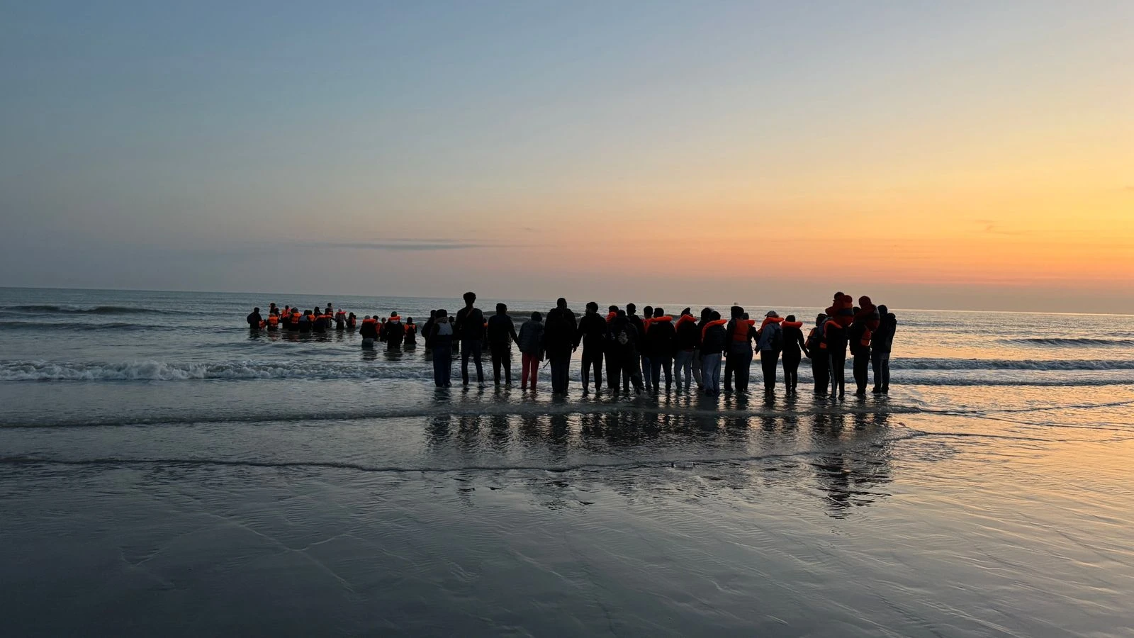 French police forced to watch on as migrants attempt perilous Channel crossing