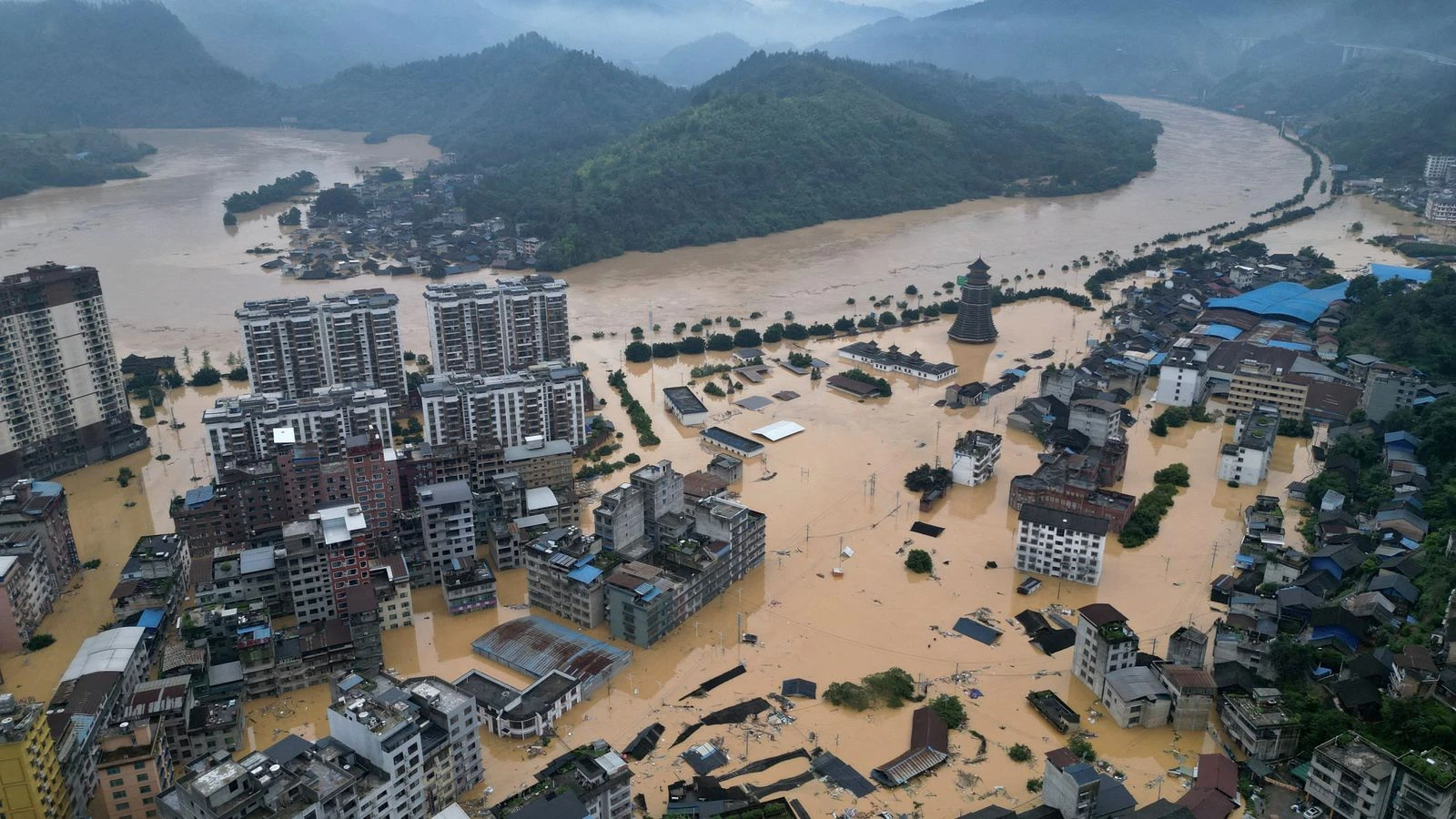 Six killed in China floods as tropical storm threatens further devastation