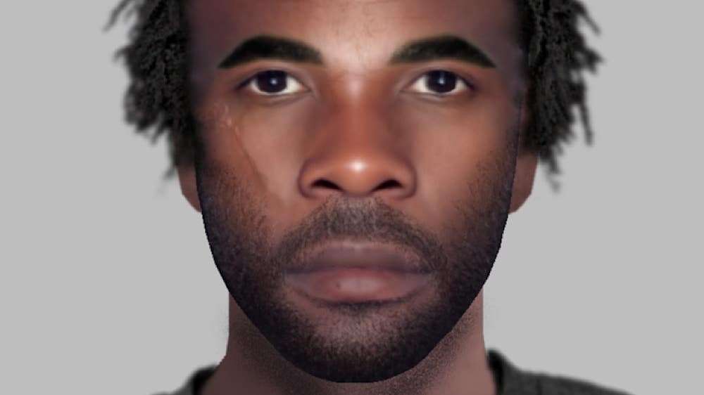 Police release e-fit image of man after woman pushed into car and raped