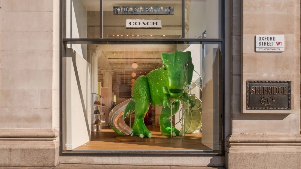 Rexy the Dionsaur Roars in Coach’s Charm Playground at Selfridges’ Corner Shop
