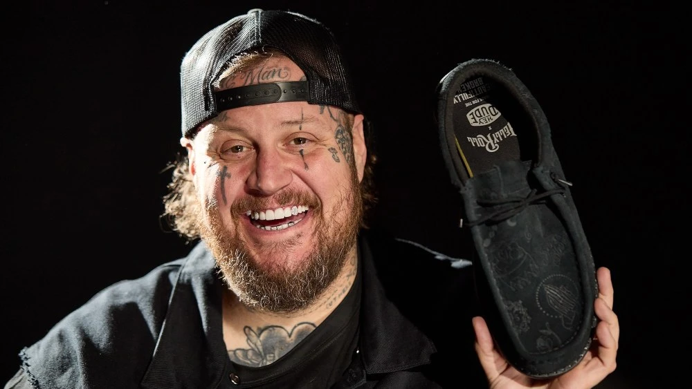 Jelly Roll Talks Partnering With Hey Dude, Shoe Requests From Luke Bryan and the Importance of ‘Second Chances’