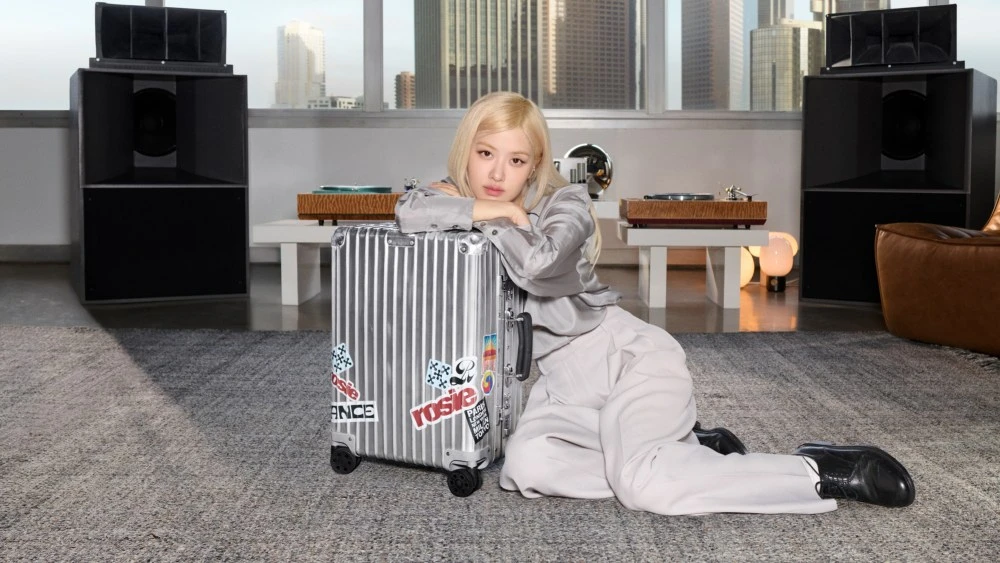 EXCLUSIVE: Rosé, Jay Chou and Lewis Hamilton Discuss Their Suitcase Stickers