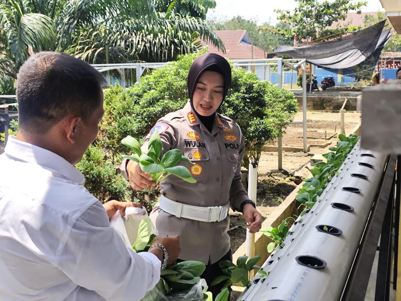 Polantas di Kampar Ajak Anak Sekolah Sayang Lingkungan Lewat Green Policing  