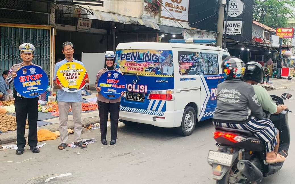 Satlantas Polresta Pekanbaru Sosialisasi Pilkada Damai di Kawasan Pasar, Tuh Lihat!