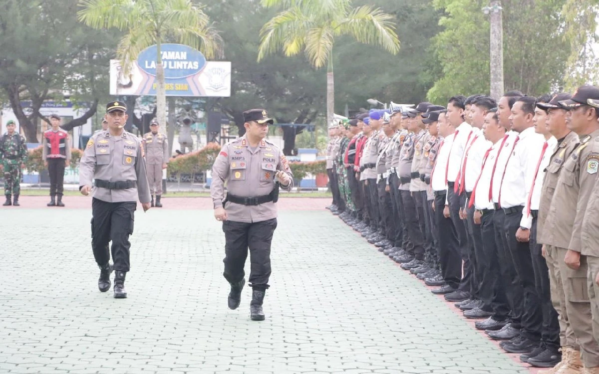 Mengawali Operasi Pengamanan Pilkada 2024, Polres Siak Menggelar Pasukan dan Deklarasikan Netralitas