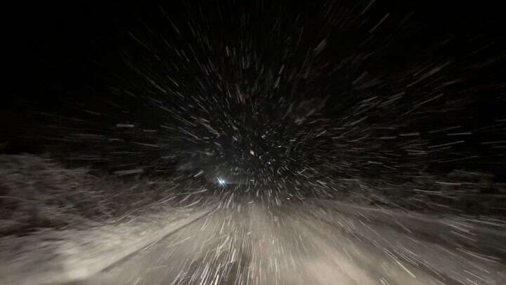 Snowfall on A3 in Surrey as weather causes flight delays