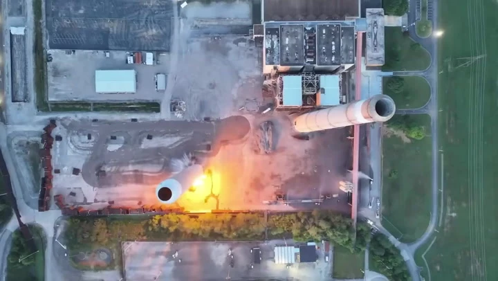 Watch: 800-foot-tall power station chimney crumbles to ground in blast