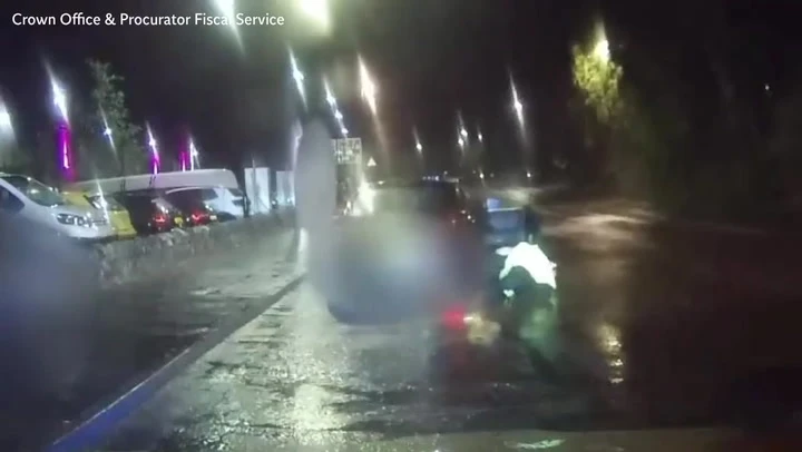 Driver drags police officers along road after fleeing traffic stop