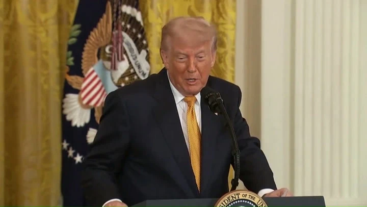 Trump says military helped stop autocorrect changing Melania’s name