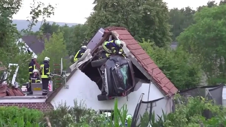 Car becomes stuck in roof after striking boy, 7, in crash
