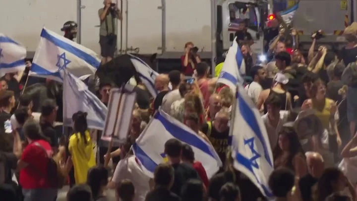 Police use water cannon on anti-government protesters in Tel Aviv