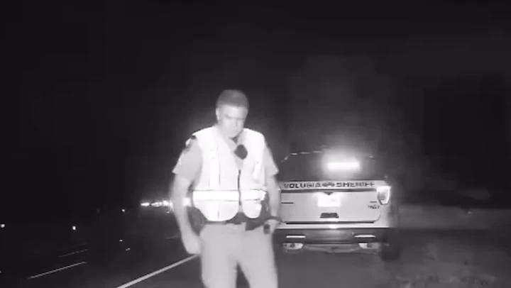 Heart-stopping moment out-of-control SUV almost hit two troopers