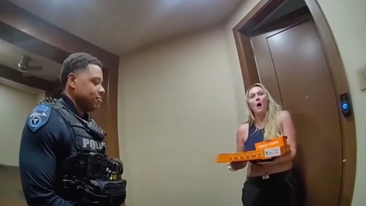 Moment police step in to deliver pizza after driver arrested