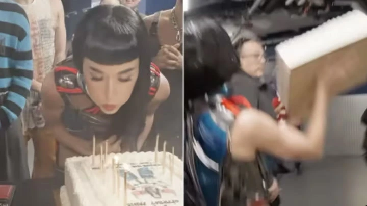 Katy Perry throws birthday cake at tour crew in bizarre video