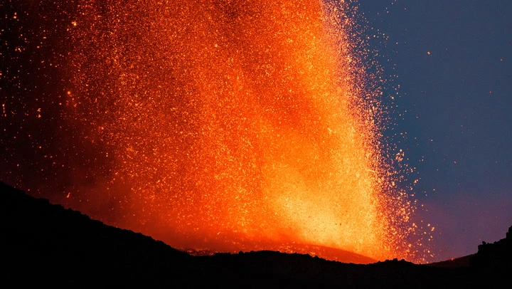 Mount Etna spews lava and ash into air as spectacular eruption unfolds