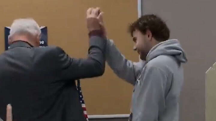 Tim Walz’s son receives huge cheer as he votes for first time