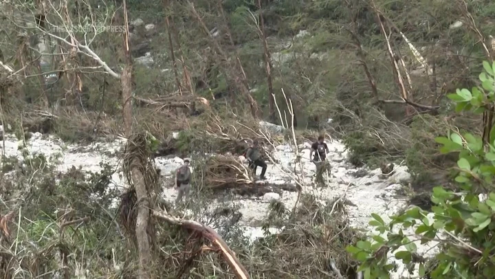 Rescuers search around Camp Mystic for survivors of Texas flash floods
