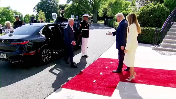 Donald Trump greets King Charles with infamous power handshake