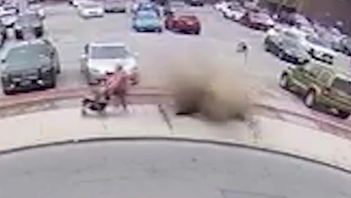 Watch: Manhole explodes as family walk home from Easter egg hunt