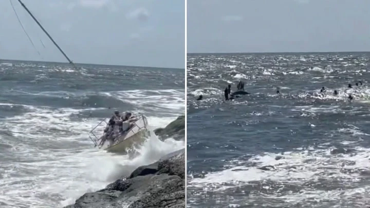 Ten people rescued after sailboat hits rocks on Jersey shore
