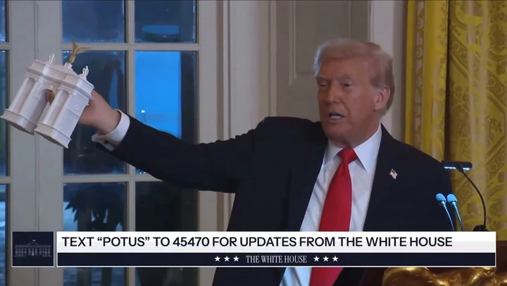 Trump shows off model of proposed DC arch for US 250th anniversary