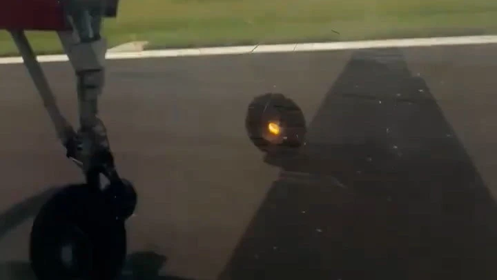 Passenger films wheel filmed falling off plane during takeoff