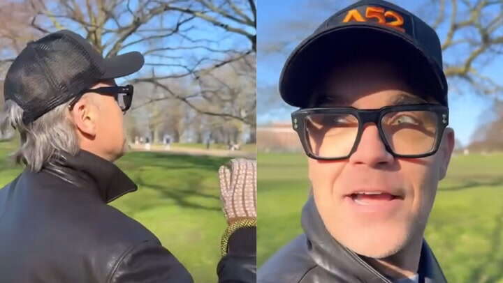 Robbie Williams walks through busy park - and no one recognises him