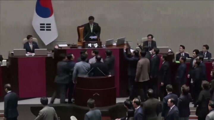 Chanting South Korean MPs swarm parliament in protest of impeachment