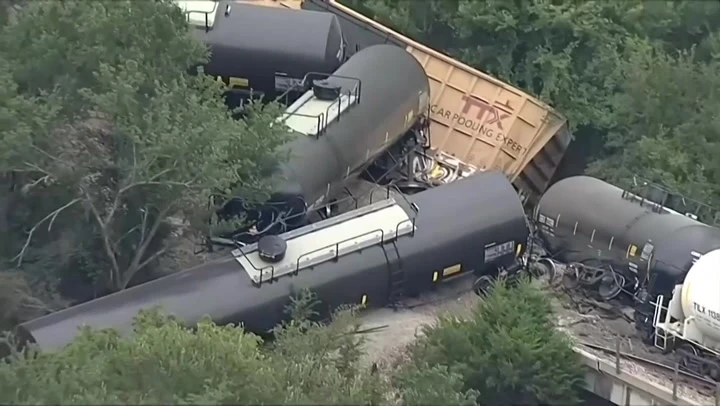 Video shows mangled train cars on top of each other after derailment