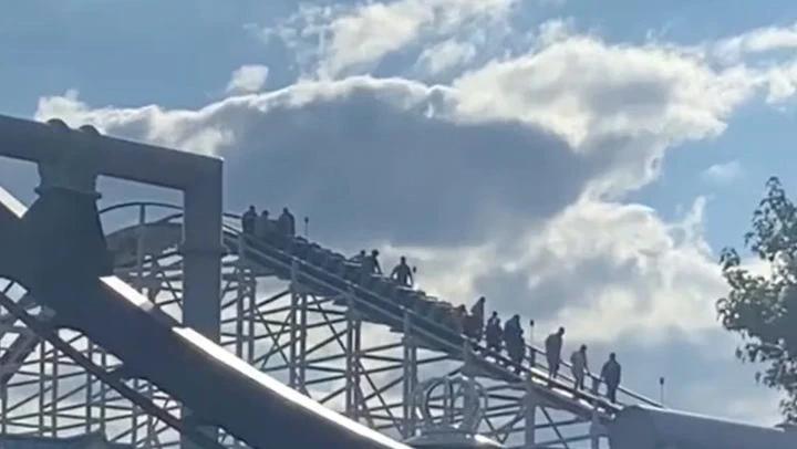 Riders evacuated from coaster days after boy scales monorail