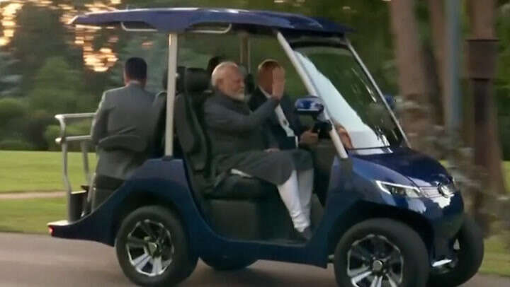 Watch: Vladimir Putin and Indian PM Narendra Modi ride in golf cart