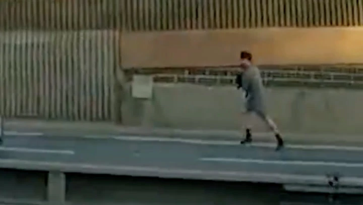 Dramatic moment police chase suspect down dual carriageway on foot