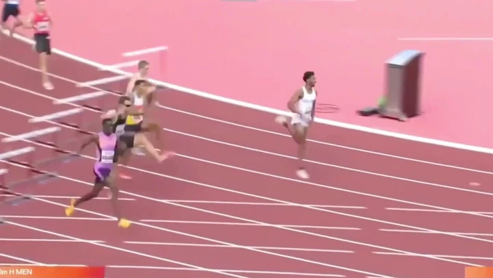 World champion’s wardrobe malfunction fails to thwart 400m win