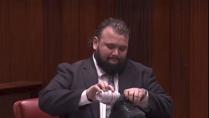 Watch moment Australian MP Kyle McGinn signs off career with a ‘shoey’